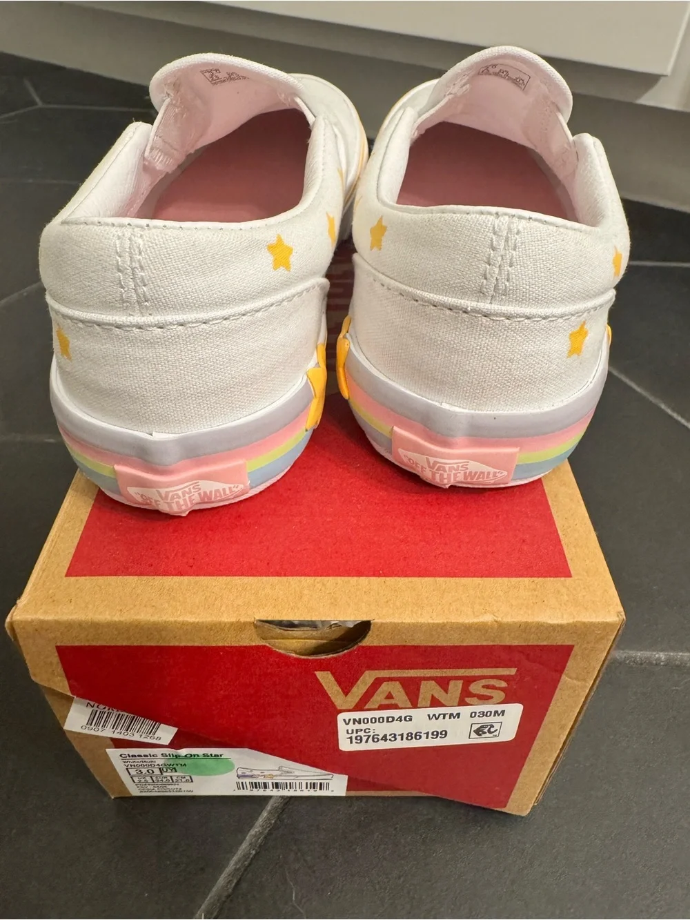Vans Kids White Slip-On Sneakers with Yellow Star Accents